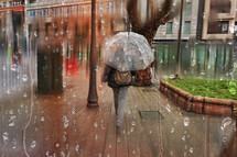 people with an umbrella in rainy days in Bilbao, basque country, spain