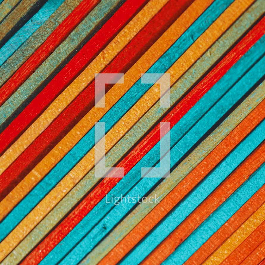 multicolored wooden sticks, colorful background