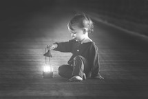 toddler boy with a lantern 