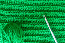 knitting green yarn 