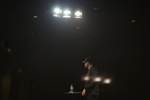 a speaker standing on stage 