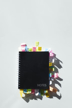 Top view of a note pad full of stick notes