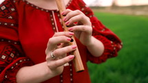 Woman Playing Woodwind Wooden Flute