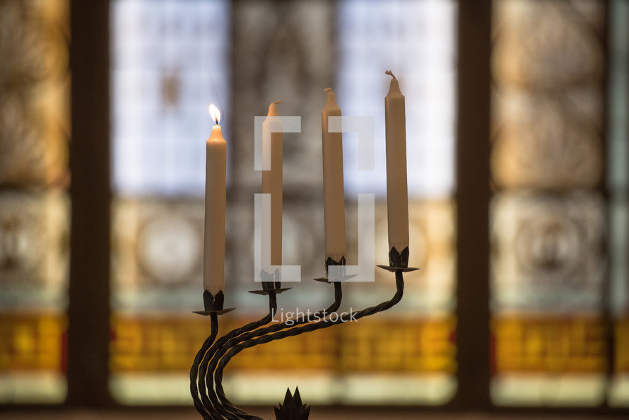 candle sticks on a candelabra