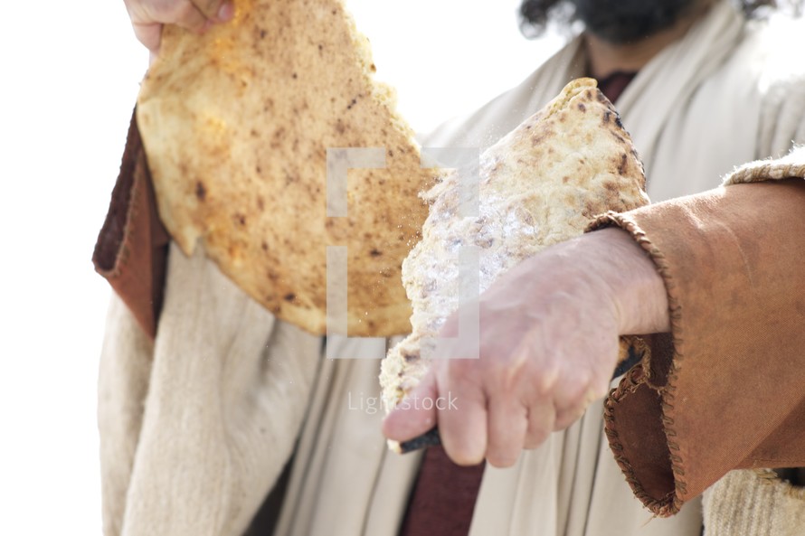 Jesus breaks bread 