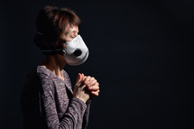 Woman Wearing Medical Protective Virus Mask praying 