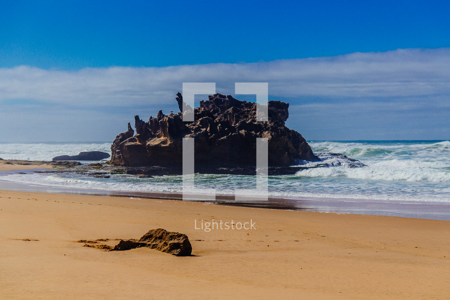 rock formations in the ocean and beach 