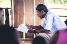 man reading scripture in Honduras 