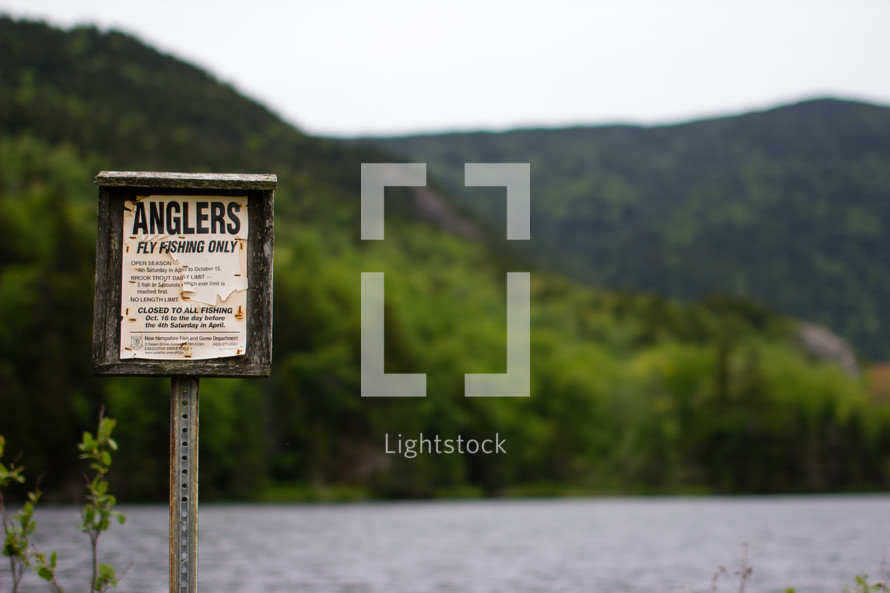 Anglers fly fishing only sign