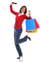 retail therapy - a woman holding shopping bags 