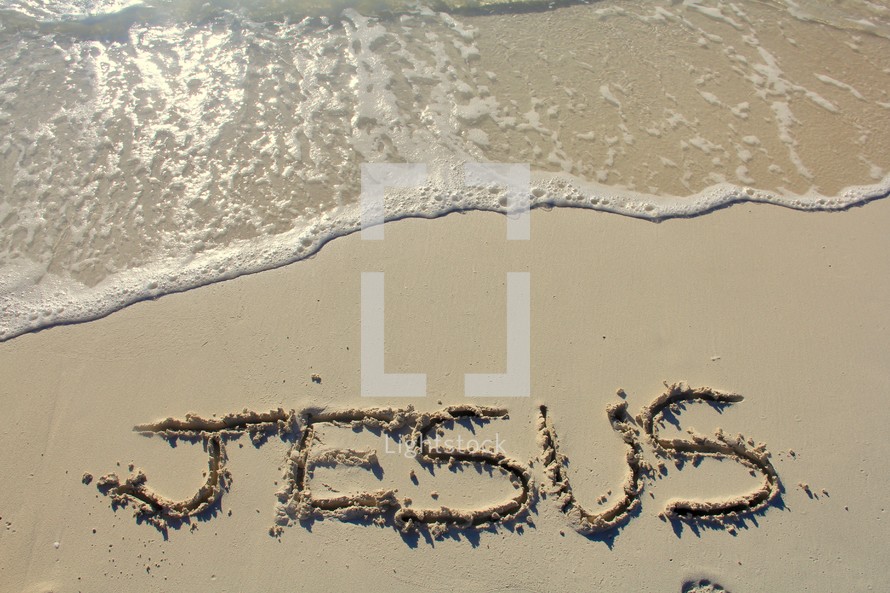 Jesus written in the sand 