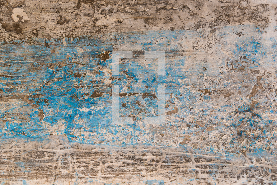 blue and tan weathered wall 