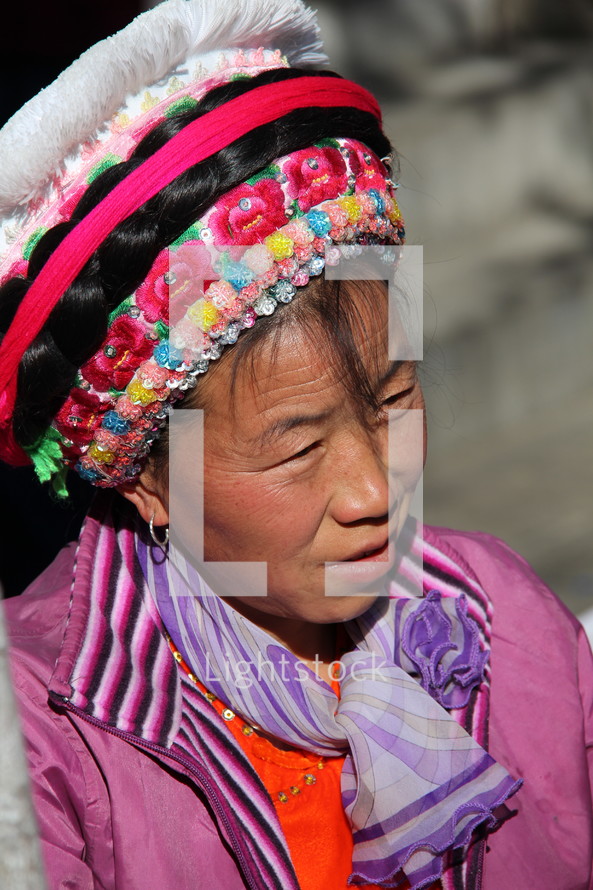 woman in a traditional hat