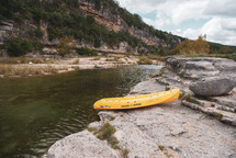 kayak on the edge of a river 