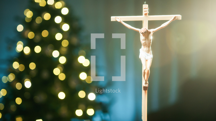 Jesus On the cross with blurred lights glowing 