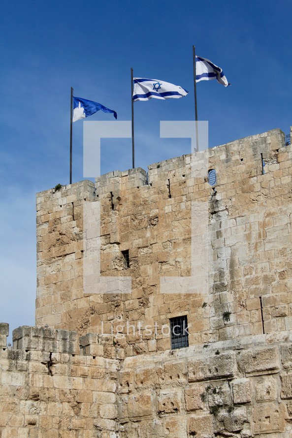 Israeli flags on the old city wall in Jerusalem 