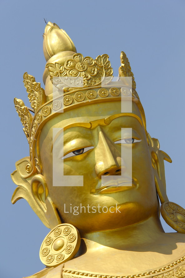 gold Buddha face