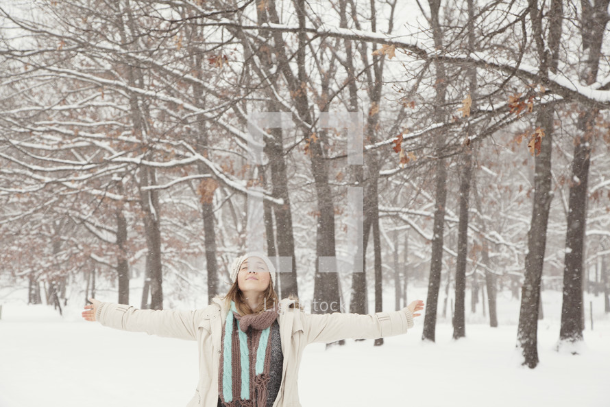 woman in a winter forest 
