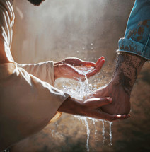 Jesus washing muddy feet