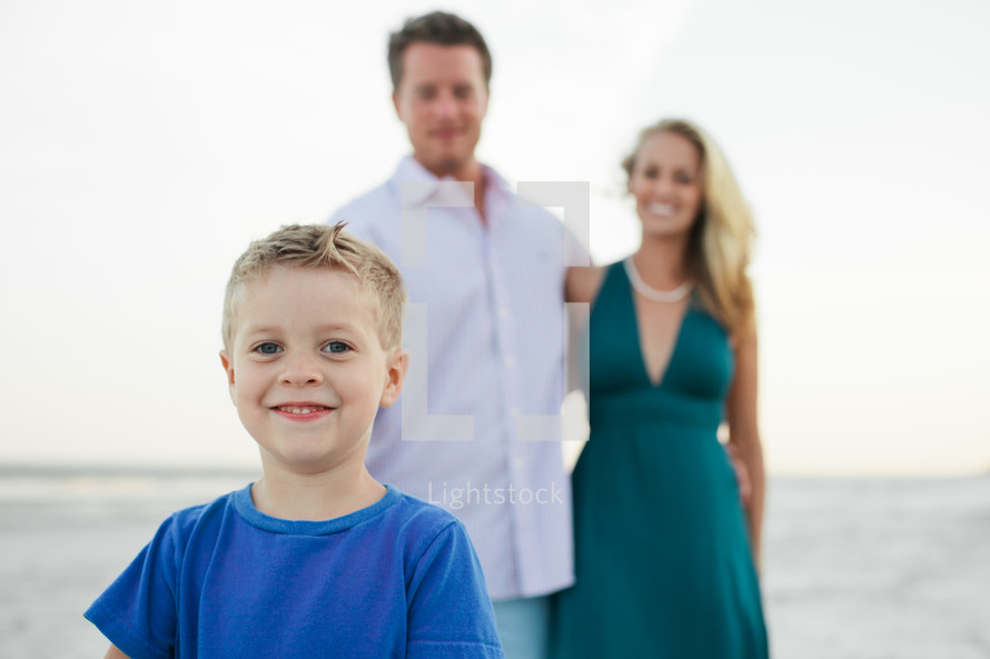 young family on a beach 