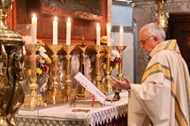 Priest during mass