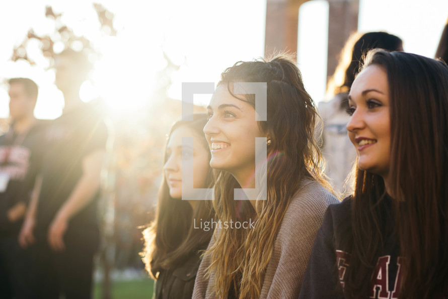 faces of young women in sunlight 