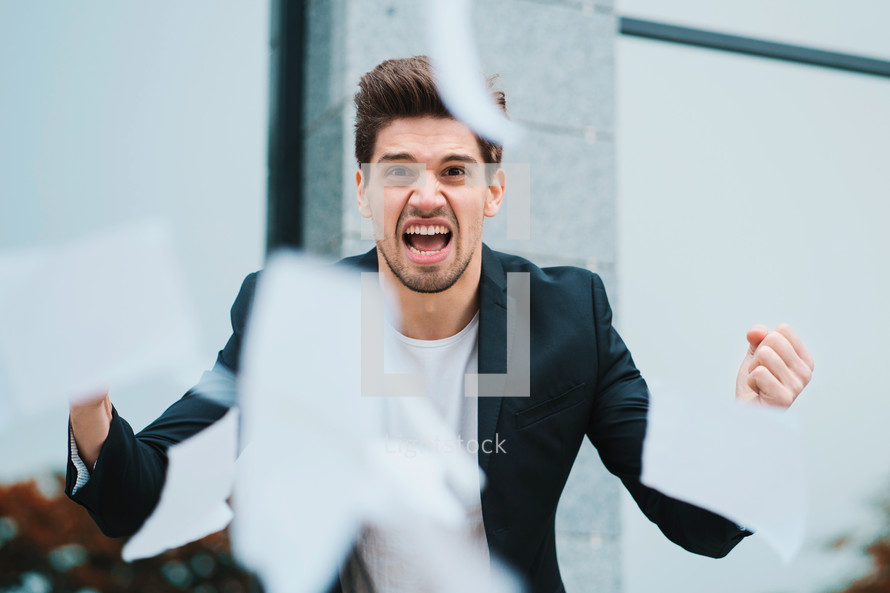 Portrait of angry furious businessman, having nervous breakdown at work, screaming in anger, stress management, mental distress problems, losing temper, reaction on failure. High quality photo