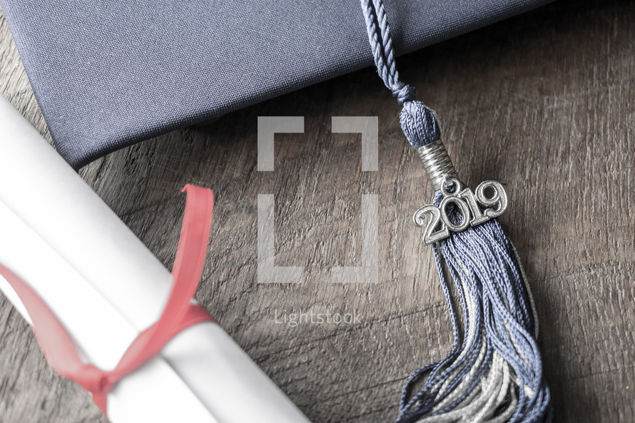 graduation cap and diploma 