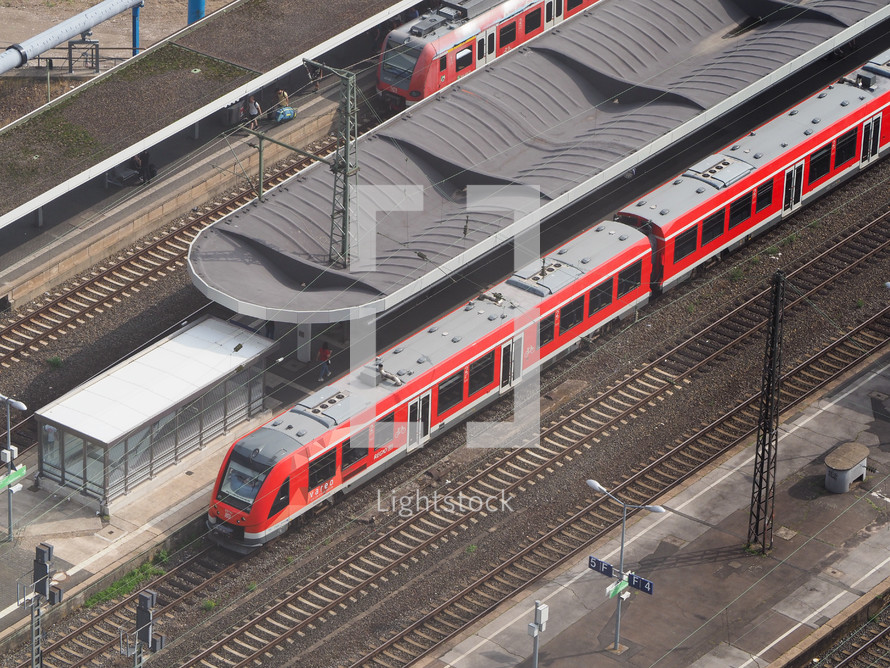 KOELN, GERMANY - CIRCA AUGUST 2019: Regional train at Deutz station, aerial view
