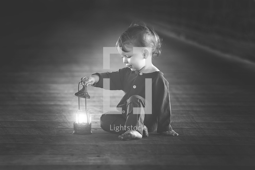toddler boy with a lantern 