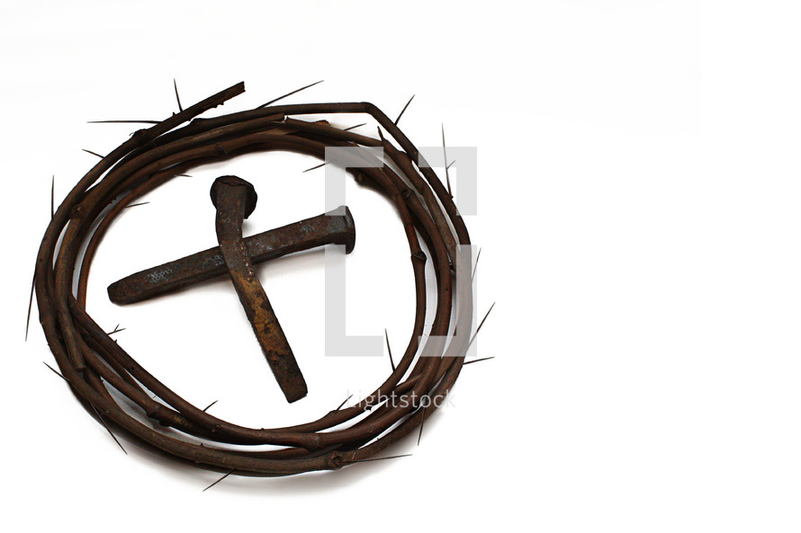 crown of thorns on white background with cross made out of nails in the center.