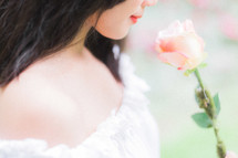 girl holding a rose 