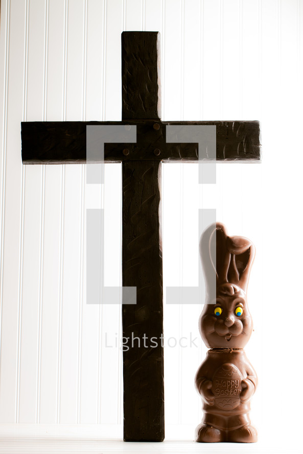 cross and a chocolate Easter bunny