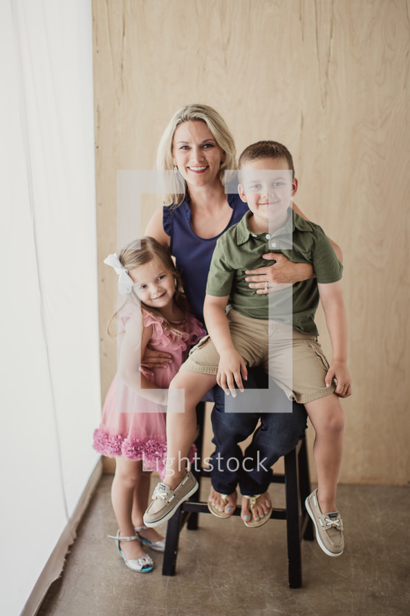 portrait of a mom and her kids 