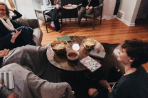 young women gather for snacks and a Bible study 