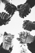 holding hands in prayer