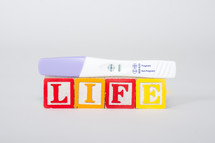life blocks and positive pregnancy test 