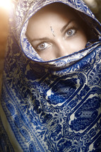 eyes of a veiled Hindu woman 