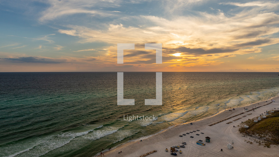 Sunset over white sand beach in Florida
