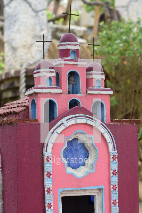 A pink church memorial in a Mexican Cemetery 