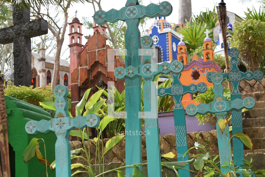 Colorful crosses and memorials to the dead in a Mexican cemetery, day of the dead, dia de los Muertos 
