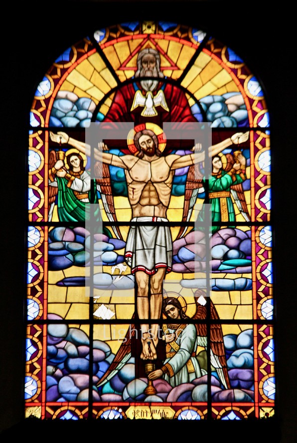 Stained glass window of the crucifixion of Jesus 
