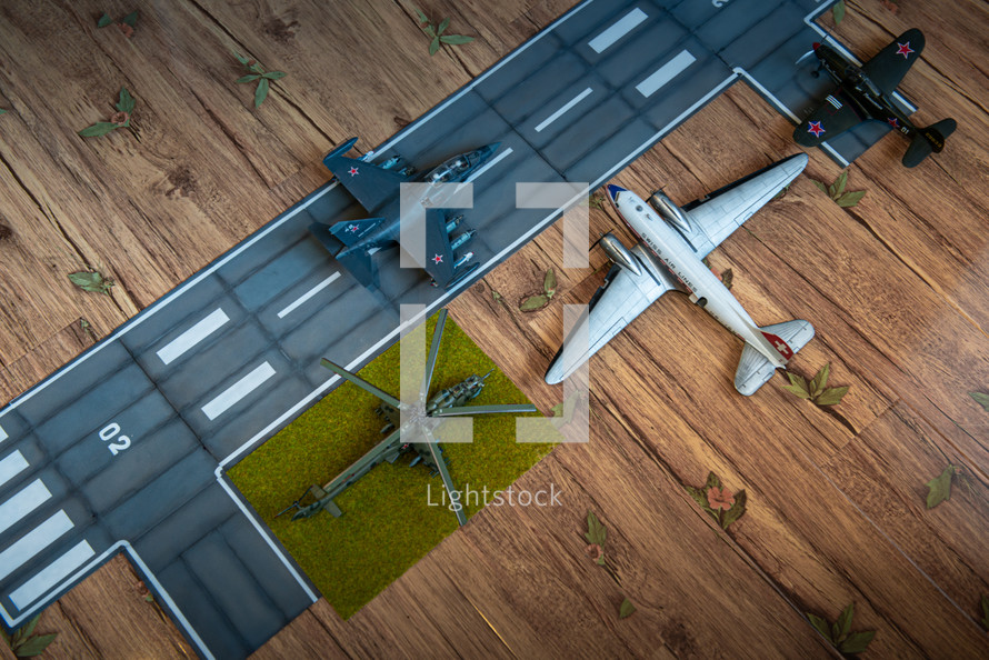 miniature model military planes and airport runway 