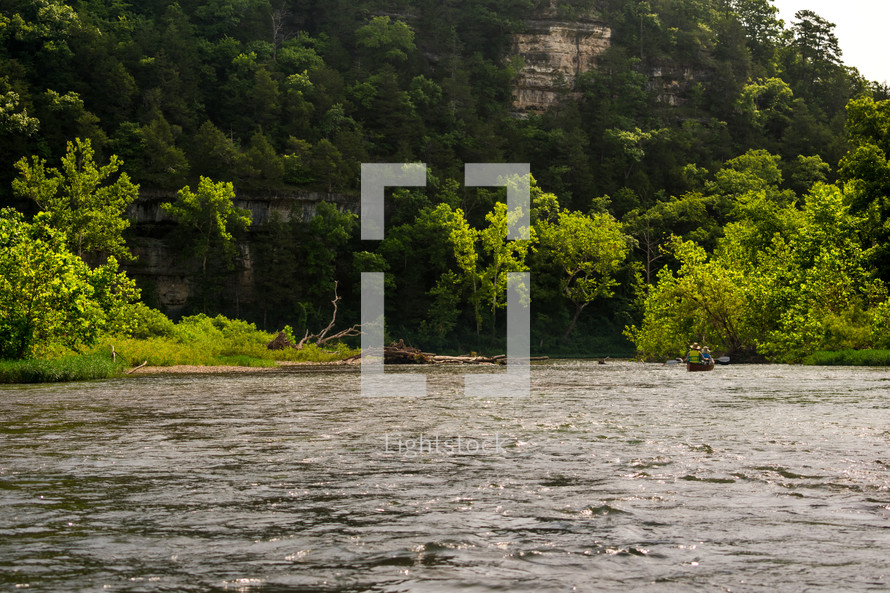 canoeing on a quite river