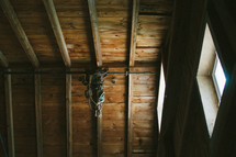 rope tied to ceiling beams