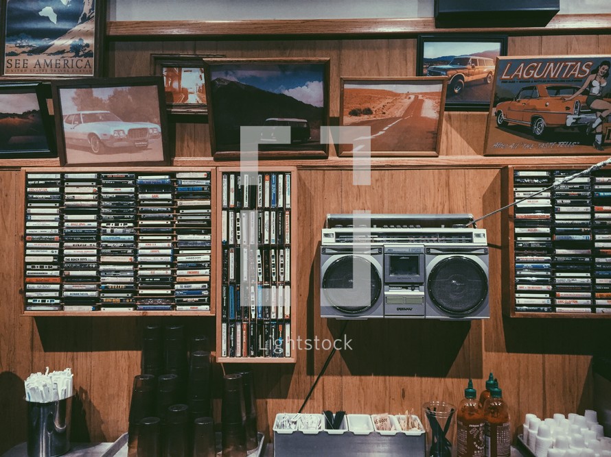 music history, cassette tapes, records, and boombox 