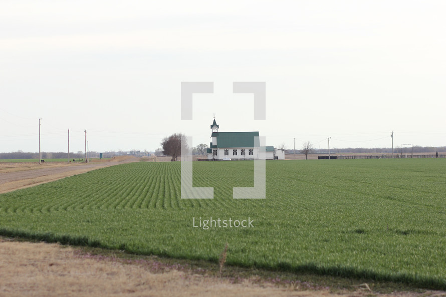 a church and farmland 
