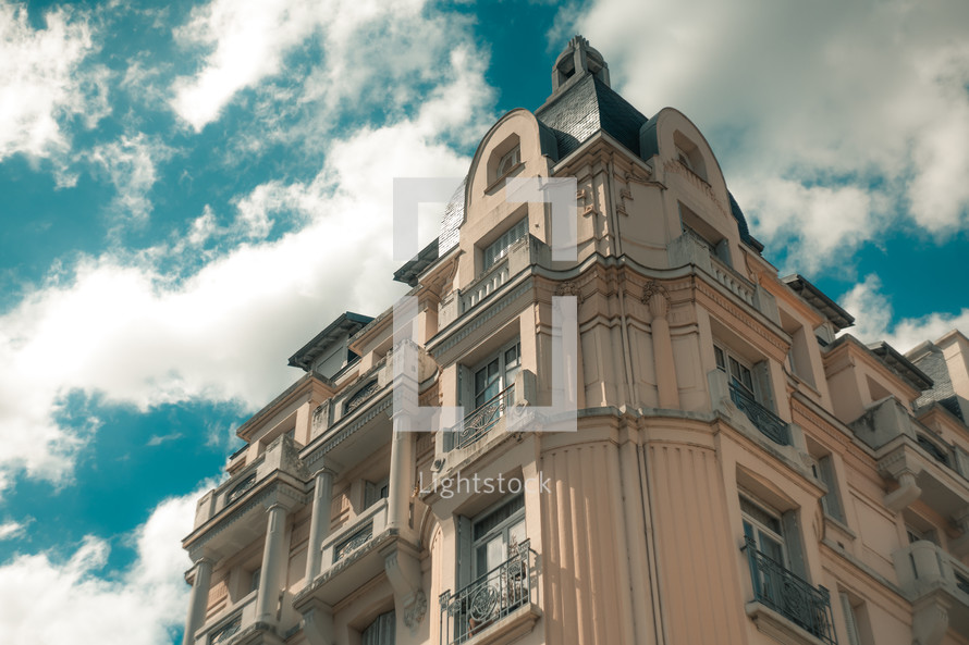 French architecture, European buildings, apartment building, beautiful design, balcony facade