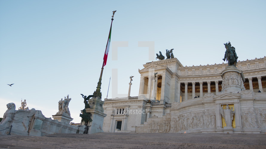 Italian Flag and the glory of Rome monuments