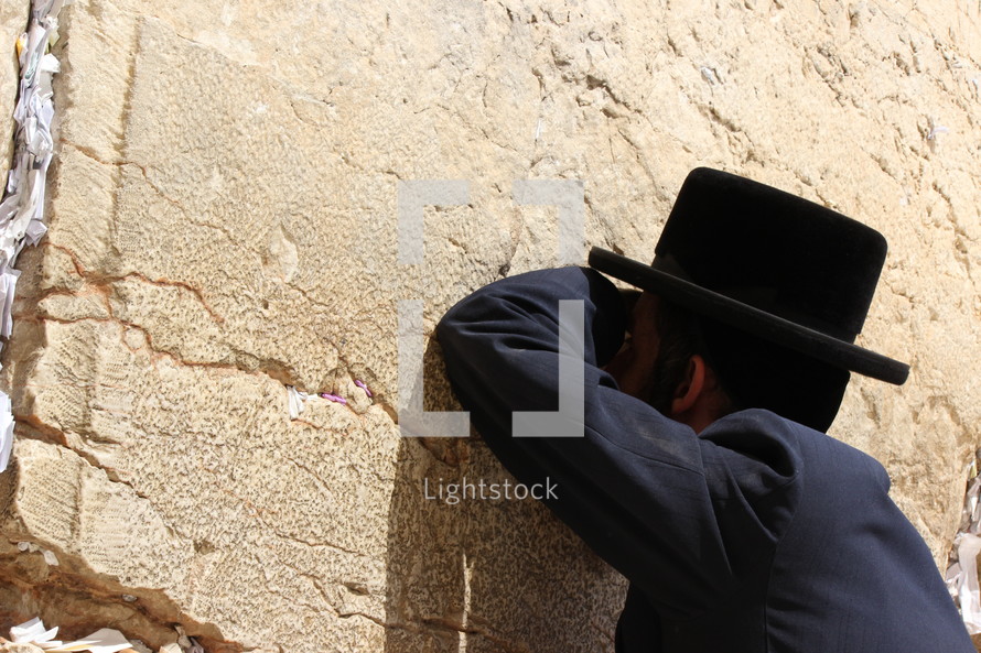 A man prays at the Wailing Wall.